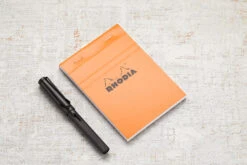 Rhodia No. 13 A6 Notepad - Orange, Graph -Office Supply Series Store Rhodia ClassicNotepad TopBound A4 No13 Stapled Graph Orange 1