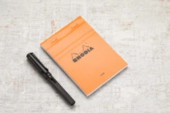 Rhodia No. 13 A6 Notepad - Orange, Lined 13 Rhodia No. 13 A6 Notepad - Orange, Lined -Office Supply Series Store Rhodia ClassicNotepad TopBound A4 No13 Stapled Lined Orange 1